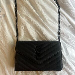 All black crossbody bag inspired! Bought as a gift worn a few times